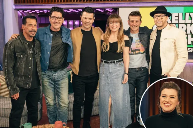 Kelly Clarkson sandwiched between five hunky heartthrobs on talk show set after she reveals post-divorce ‘dating plans’