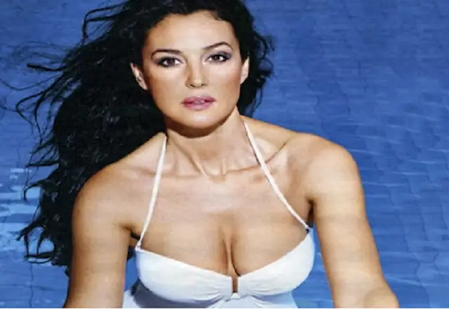 Monica Bellucci slays in nothing but red hot bikini that pulled out her N so much.__ See Photos