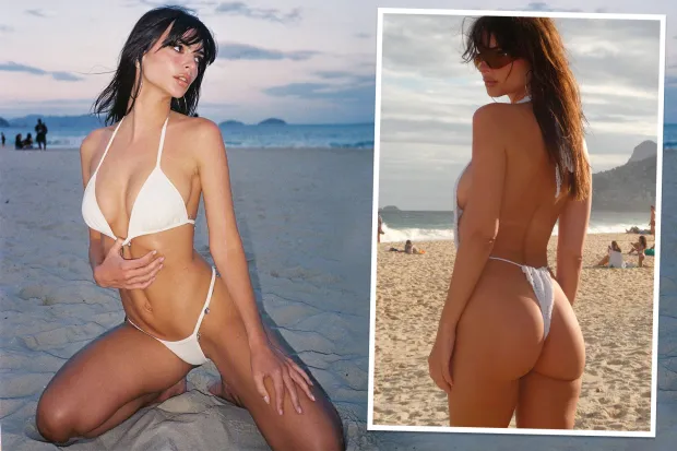 Emily Ratajkowski risks wardrobe malfunction as she tugs at white bikini top in sexy beach shoot